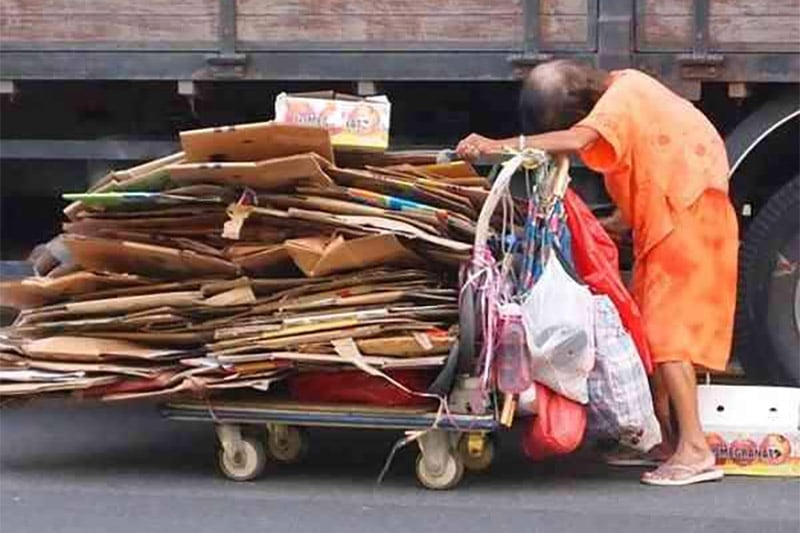 An elderly cardboard collector in Singapore