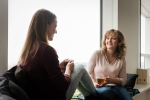 mother having conversation with daughter